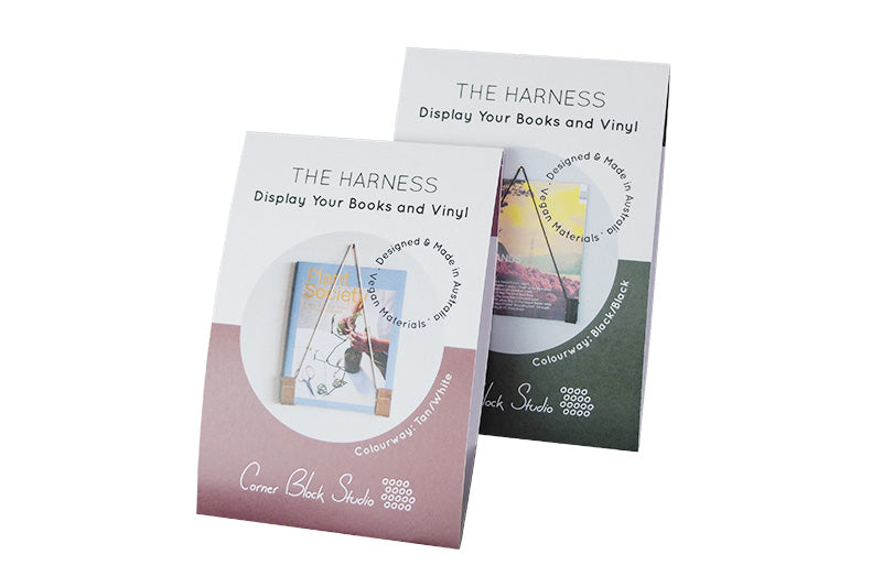 The Harness Book and Vinyl Hanger in Packaging