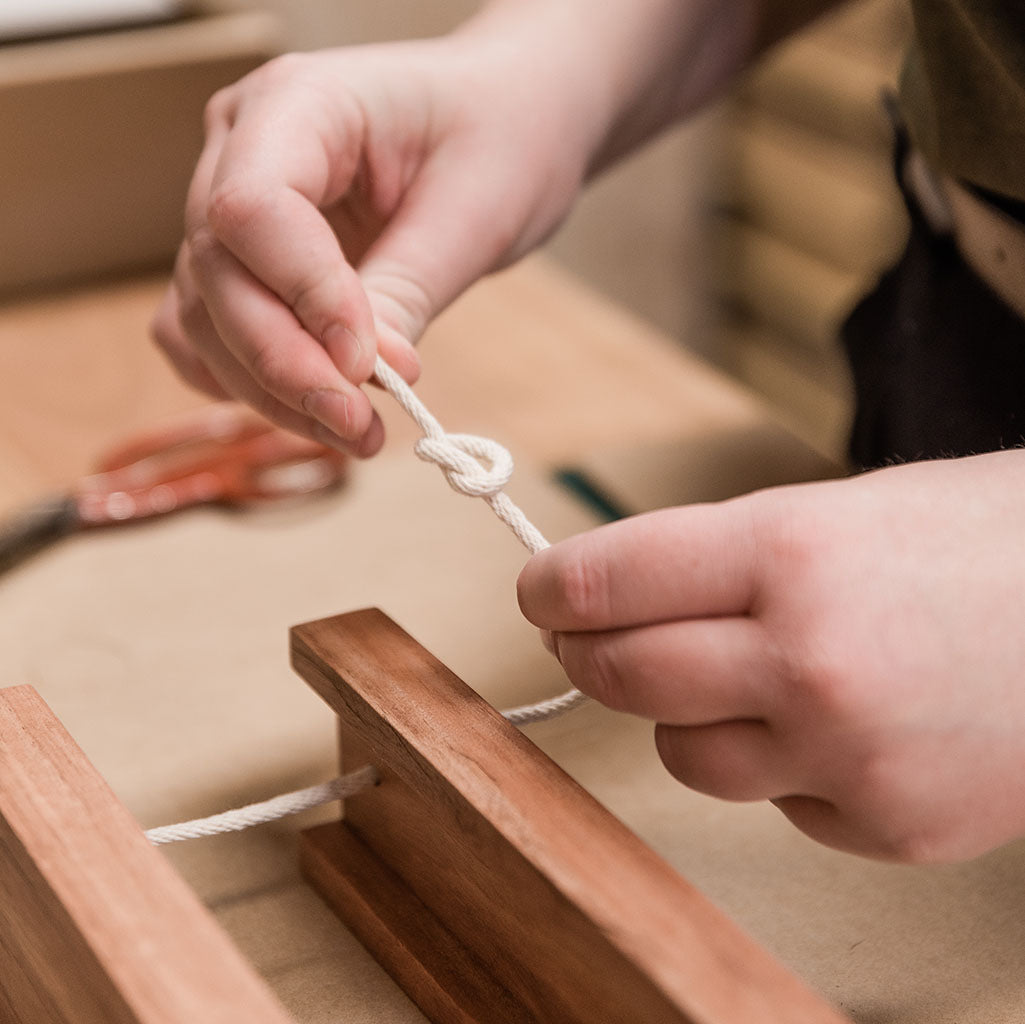 Assembling our timber frames with 100% cotton cord in the workshop at Corner Block Studio, Brisbane, Australia